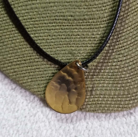 Goldtone teardrop pendant on black cord necklace - Picture 3 of 5